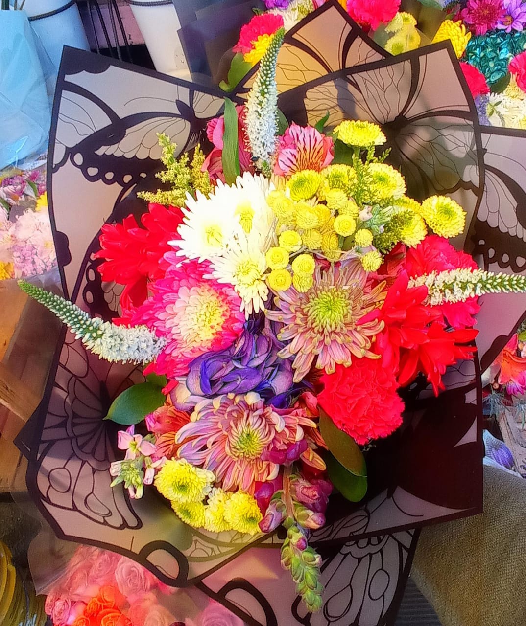 “Alas de Primavera – Ramo de flores multicolor”